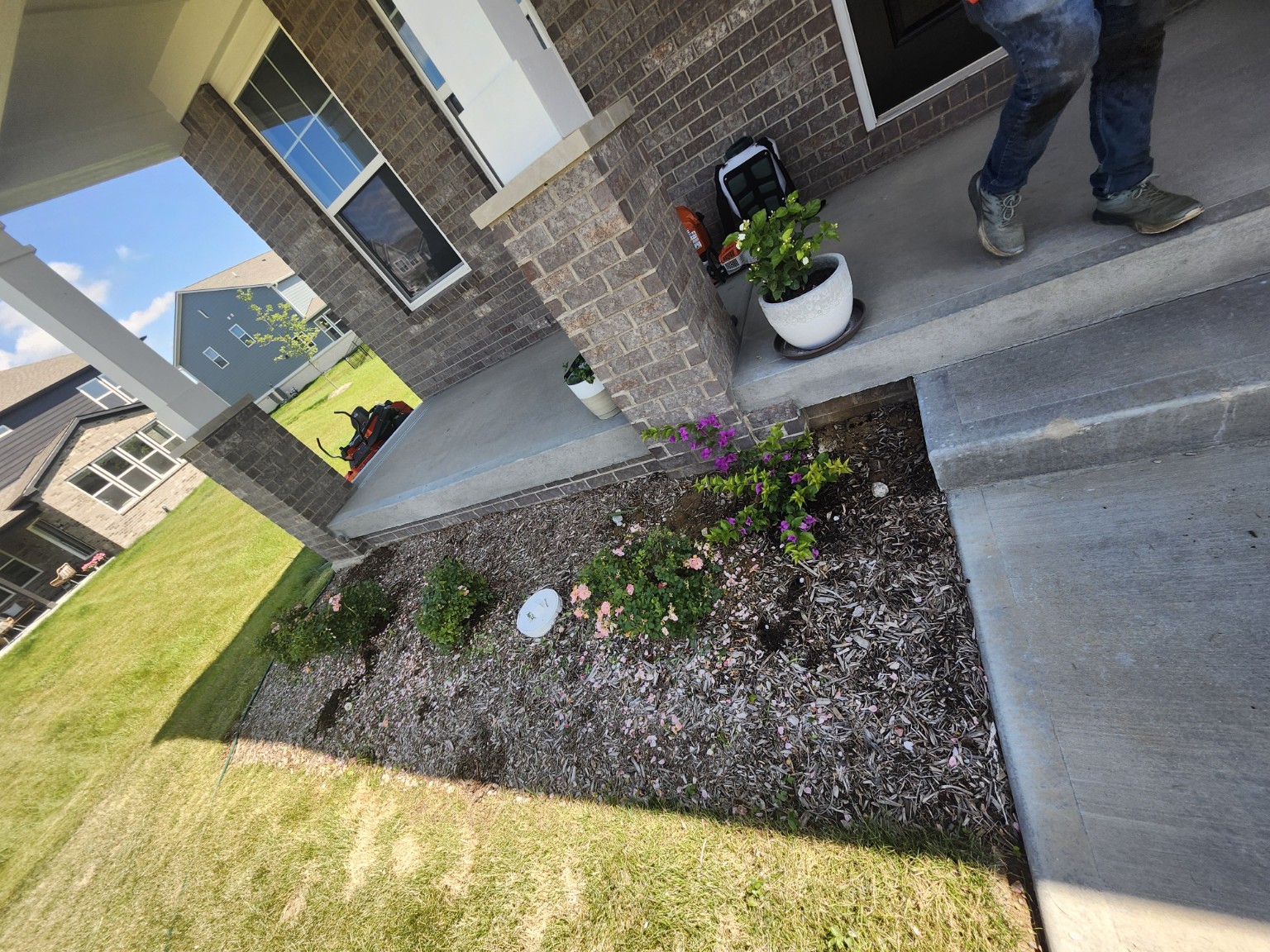 Existing front flower bed before refresh